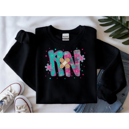 RN with a Bandage, snowflake sweater, Nurse crewneck sweatshirt, colorful bandage graphic, medical theme, Nurse Gift, Holiday Nurse Gift