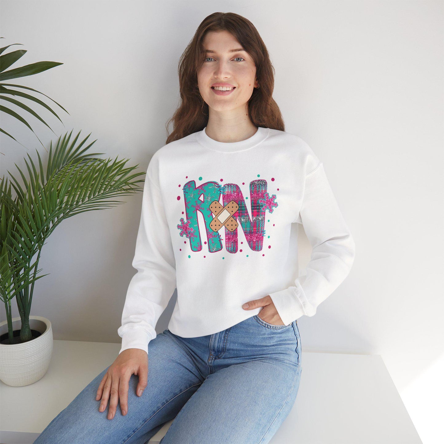 RN with a Bandage, snowflake sweater, Nurse crewneck sweatshirt, colorful bandage graphic, medical theme, Nurse Gift, Holiday Nurse Gift